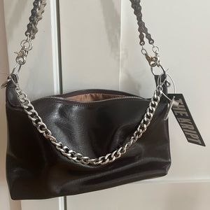 The KRIPT Dolora bag. Color is maroon/burgundy. Never worn still has tags.